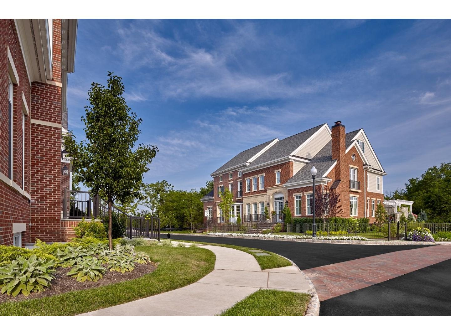 28 Creek Run, New Hope, a brick townhome on a curving street
