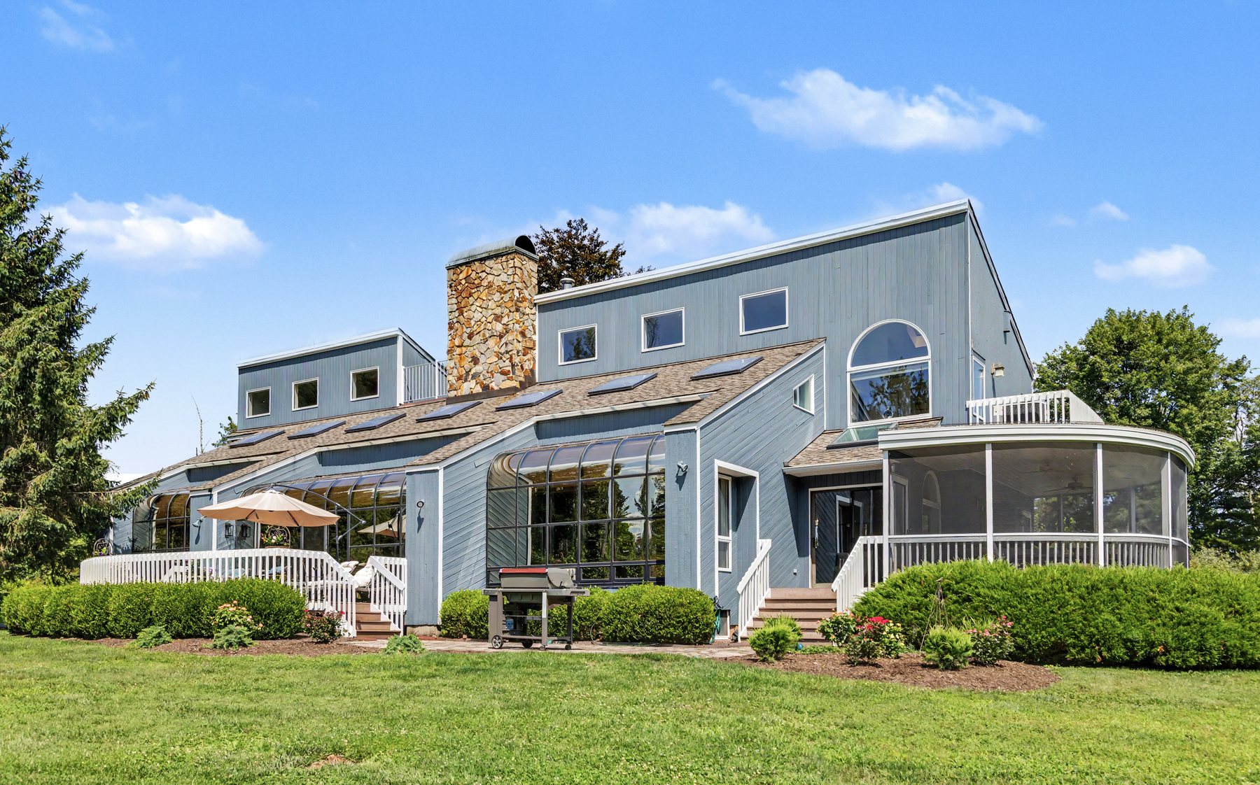212 Sandy Ridge Road, Stockton, New Jersey, a contemporary home on a wide lawn